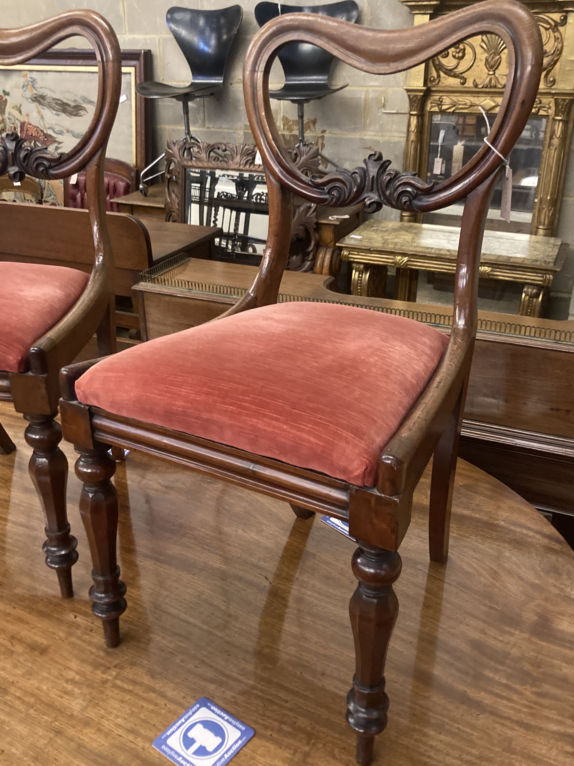 A set of four Victorian mahogany dining chairs